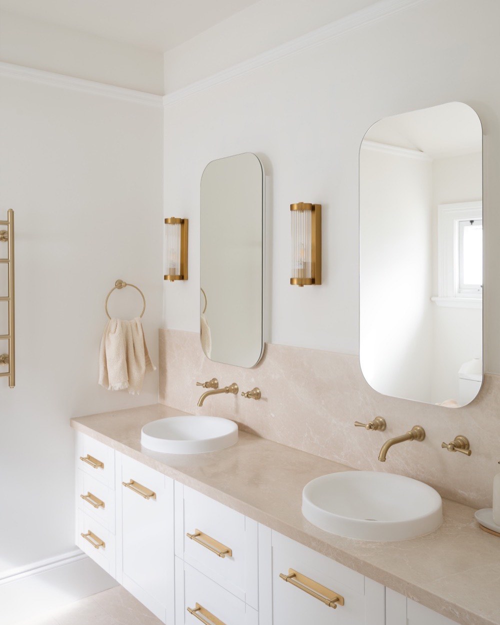 Double stone vanity with brass tapware