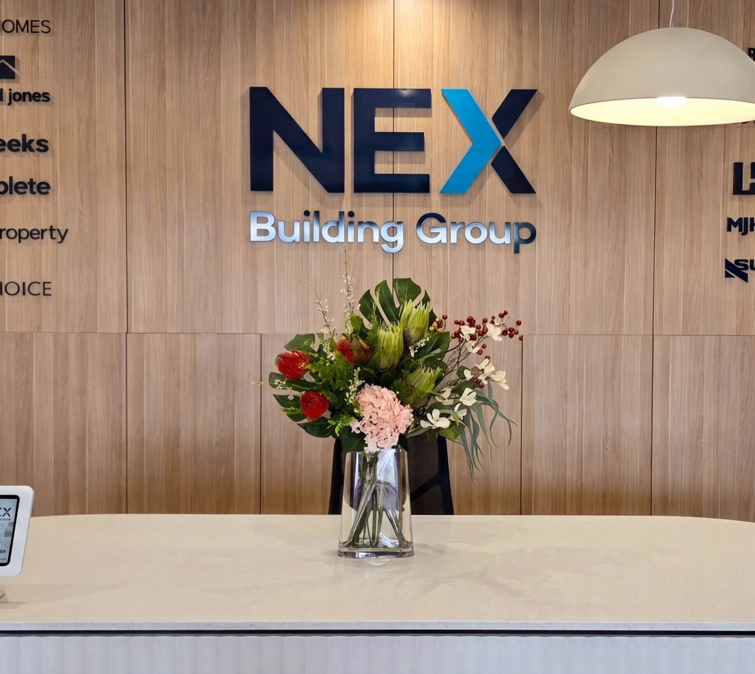Stone reception desk at the NEX Building Group office in Newcastle